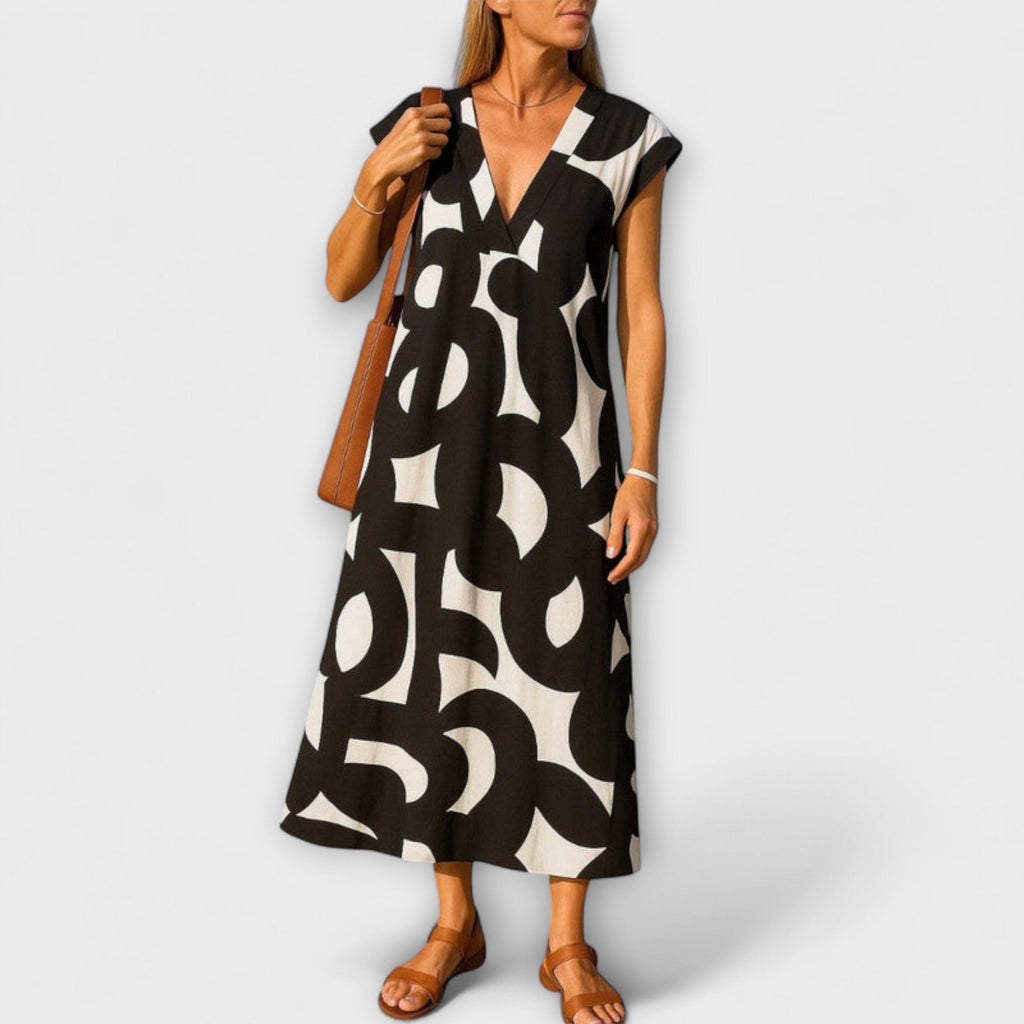 Linae - Zwart-wit Kleid met V-hals